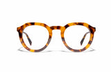 Image of Cheeterz Club eyewear. Photo of round eyeglasses with clear lenses and blue light blocking technology. The frames are medium width with glitter infused golden brown and black color and spotted print, suitable for square, oval, and oblong face shapes. These glasses can be used as reading glasses with blue light glasses.