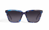Image of Cheeterz Club eyewear. Photo of cat eye sunglasses with gray tinted lenses.  The frames are medium width with light and dark blue color. Suitable for round, oval, and heart shaped face shapes. 
