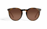 Image of Cheeterz Club eyewear. Photo of retro classic round sunglasses with brown tinted lenses. The frames are medium width and light and dark brown color. Suitable for square, oval, and oblong shaped face shapes. 